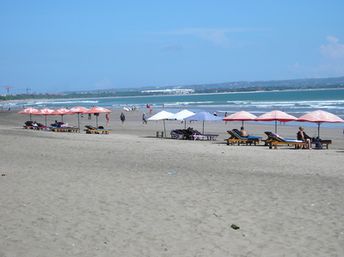 Indonesia, Bali, Seminyak beach, parasols