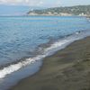 Italy, Tuscany, Capalbio beach, dark sand