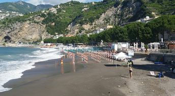 Italy, Amalfi, Maiori beach, wet sand