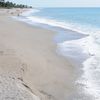 Italy, Caulonia Marina beach, wet sand