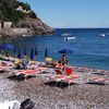 Italy, Marina del Cantone beach, sunbeds