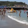 Italy, Marina di Puolo beach, wet sand