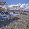 Italy, Calabria, Rossano beach, sunbeds