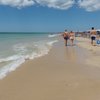 Italy, Apulia, Torre Pali beach, wet sand