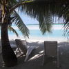 Cook Islands, Aitutaki atoll, Samade on the beach (Ootu), under the palm tree