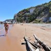 Italy, Apulia, Calenella beach, near rocks, wet sand