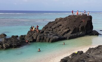 Cook Islands, Rarotonga, Black Rock beach, black boulder