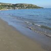 Italy, Abruzzo, Fossacesia Marina beach, wet sand