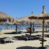 Italy, Abruzzo, Pescara-south beach, tiki huts