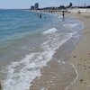 Италия, Марке, Пляж Порто-Потенца-Пичена, мокрый песок и камни