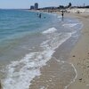 Italy, Marche, Porto Potenza Picena beach, wet sand & stones