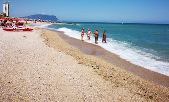 Italy, Marche, Porto Recanati beach, water edge