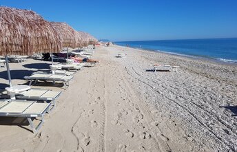 Italy, Marche, Porto Sant'Elpidio beach, tiki huts