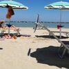 Italy, Marche, Palombina beach, sunbeds