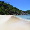 Seychelles, Mahe, Anse Du Riz beach, wet sand