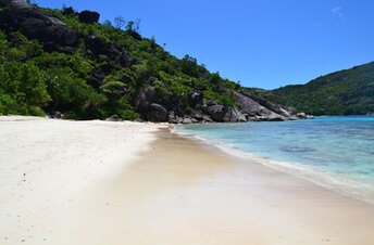 Seychelles, Mahe, Anse Du Riz beach, wet sand
