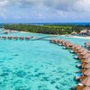 Maldives, Gaafu, Kooddoo island, water villas, aerial view