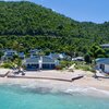 BVI, Virgin Gorda, Mahoe Bay beach, Mango Bay Resort, aerial view