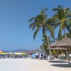 Mexico, Playa la Ropa beach, tiki huts