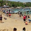 Mexico, Puerto Escondido, Playa Manzanillo beach, crowd