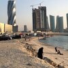 Bahrain, Bahrain Bay beach, cars
