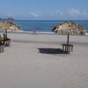 Honduras, Playa Marejada beach, tiki huts