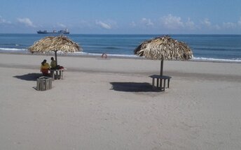 Honduras, Playa Marejada beach, tiki huts