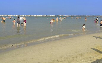 Italy, Emilia-Romagna, Gatteo A Mare beach, wet sand