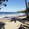 Trinidad, Marianne Bay beach, palm shade