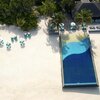 Maldives, Haa Alifu, Manafaru island, beach pool, aerial view