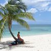 Cuba, Playa Ancon beach, palm