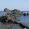 Italy, Sicily, Ciclopi beach, islets