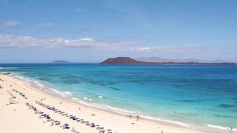 Spain, Canary Islands, Fuerteventura island, Corralejo beach, parasols