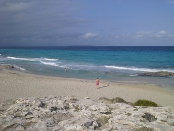 Spain, Platja de Llevant beach, man