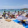 Spain, Platja de Ses Illetes beach, island on the horizon