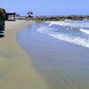 Колумбия, Барранкилья, Пляж Пуэрто-Колумбия, мокрый песок