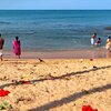 India, Kerala, Thirumullavaram beach, swimming