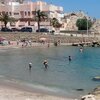 Spain, Valencia, Cala El Faro beach, swimming