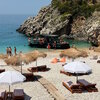 Albania, Saint Andreas Bay beach, tiki huts