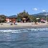 Italy, Liguria, Marinella di Sarzana beach, view from water