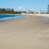 Australia, Gold Coast, Kirra beach, wet sand