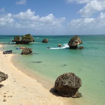 Japan, Okinawa, Mibaru beach, rocks in the water