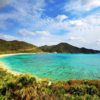 Japan, Okinawa, Tokashiki island, Aharen beach, looking to ferry dock