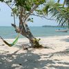 Guatemala, Rio Dulce, Playa Blanca beach, hammock