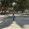 Maldives, Himmafushi beach, boy